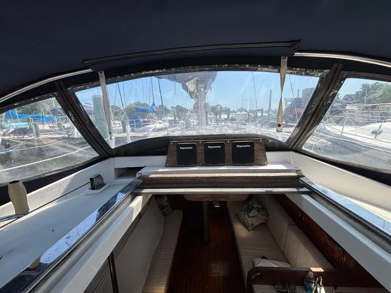 Slide: The Image of Interior view of 1988 Bristol 33.3 sailboat cockpit with navigation equipment. - 32