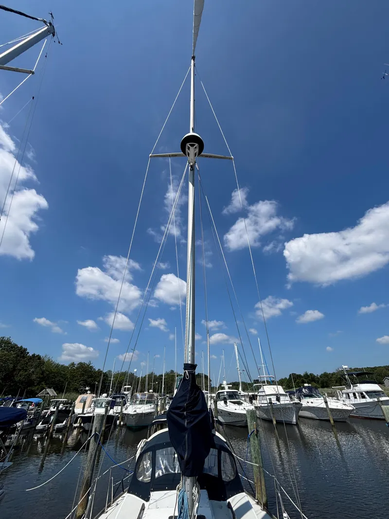 Slide: The Image of Sailboat in marina under blue sky, Bristol 33.3, 1988 model. - 9