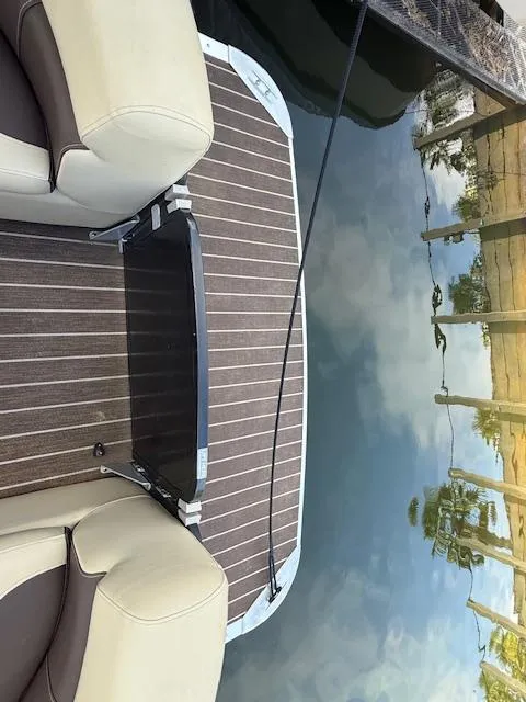 Slide: The Image of 2022 Premier 250 Sunsation boat deck with water reflection and seating. - 10