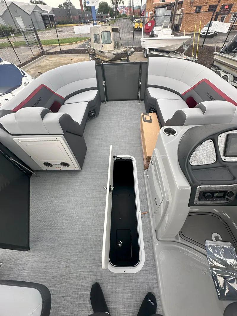 Slide: The Image of Interior of 2026 Flagship D22CU Extended Deck boat with spacious seating and storage. - 11