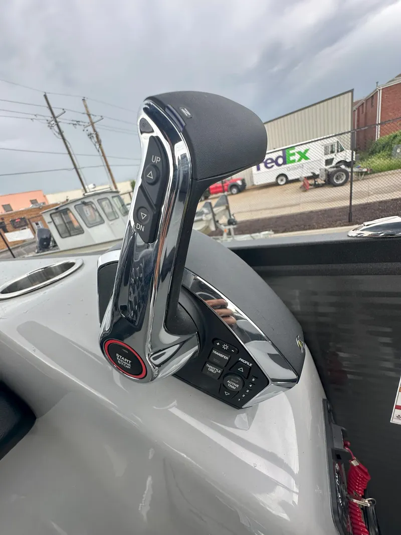 Slide: The Image of Throttle control of 2026 Flagship D22CU Extended Deck boat, featuring start and trim buttons. - 8