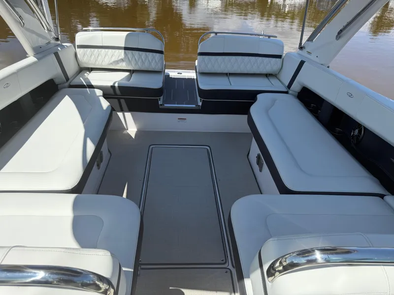 Slide: The Image of 2023 Regal 2800 Bowrider interior with luxurious seating and elegant design. - 12