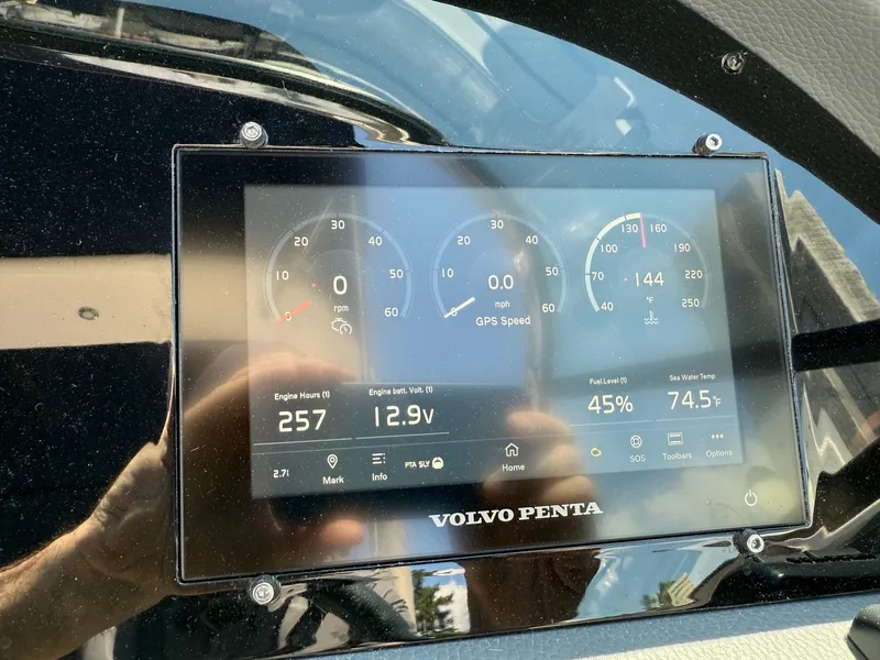 Slide: The Image of Dashboard display of a 2023 Regal 2800 Bowrider showing engine metrics and GPS speed. - 15