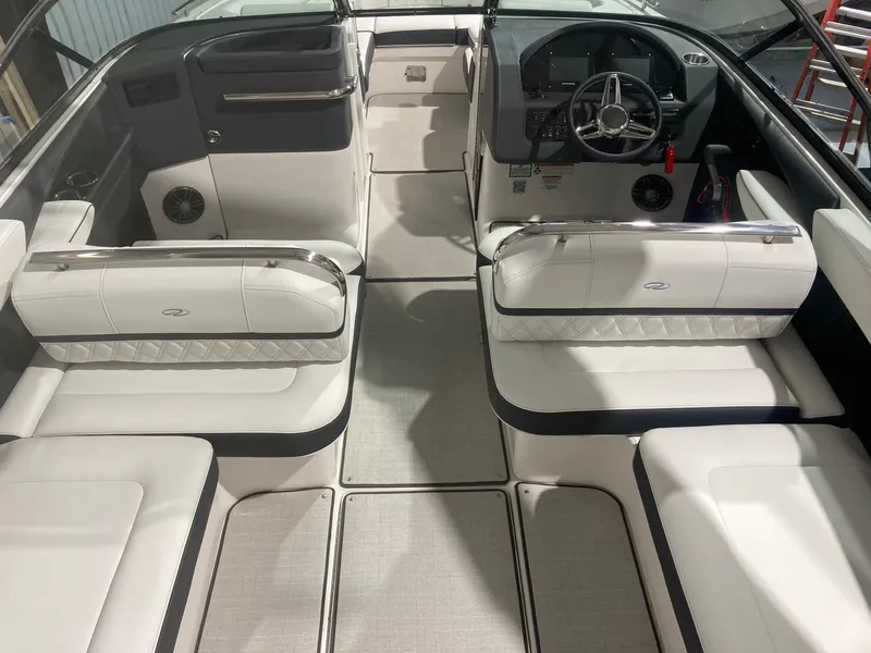 Slide: The Image of 2023 Regal 2800 Bowrider interior with luxurious seating and modern dashboard design. - 7
