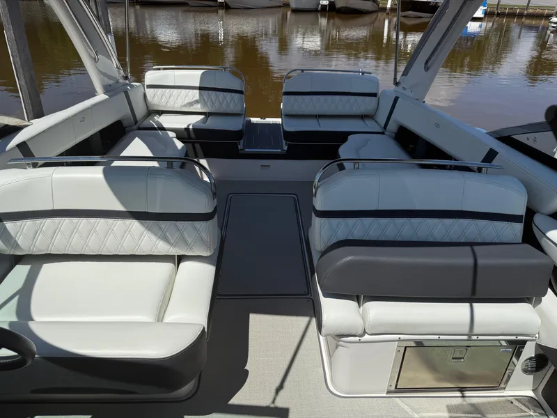 Slide: The Image of 2023 Regal 2800 Bowrider interior with luxurious seating and elegant design. - 9
