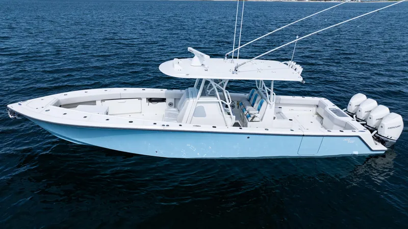 The Image of 2021 SeaVee 390 boat on open ocean under clear sky. - 0