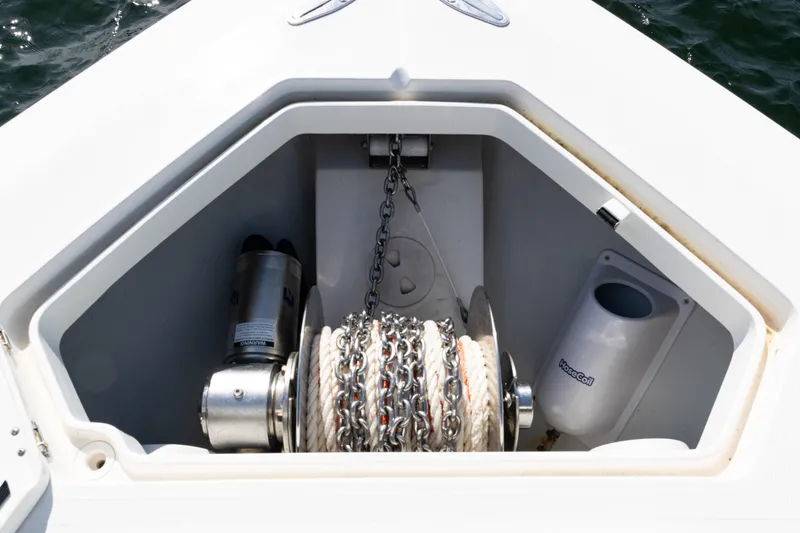 Slide: The Image of Anchor storage compartment on 2021 SeaVee 390 boat, featuring chain and rope. - 31