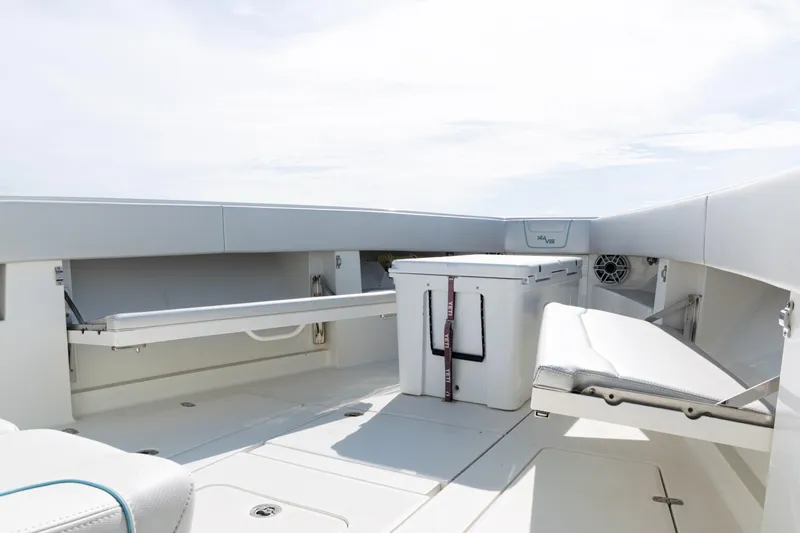 Slide: The Image of 2021 SeaVee 390 boat interior with seating and storage compartments. - 36
