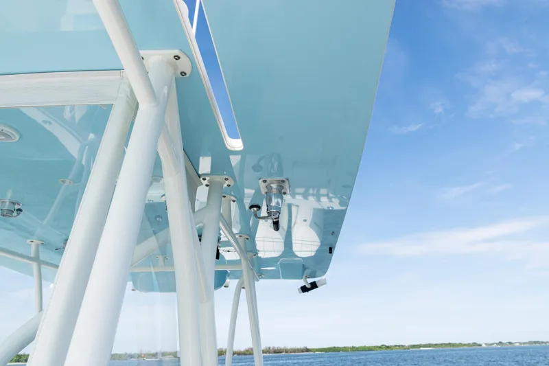 Slide: The Image of 2021 SeaVee 390 boat canopy against a clear blue sky. - 40