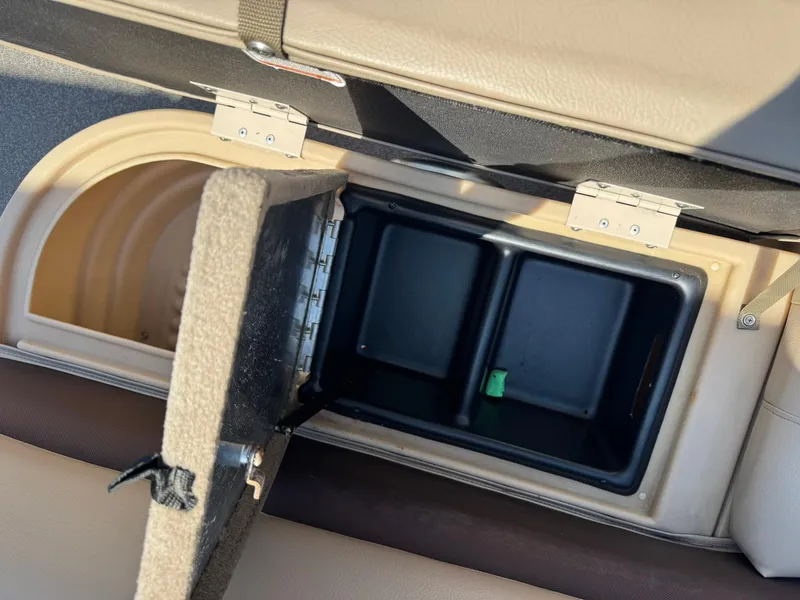 Slide: The Image of Open storage compartment on 2017 Sun Tracker Party Barge 20 DLX boat. - 12