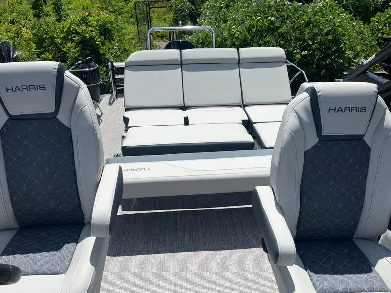 Slide: The Image of 2026 Harris Grand Mariner 230 boat interior with luxurious seating and sleek design. - 12