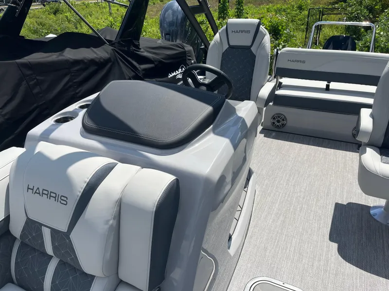 Slide: The Image of 2026 Harris Grand Mariner 230 boat interior with luxurious seating and modern design. - 13