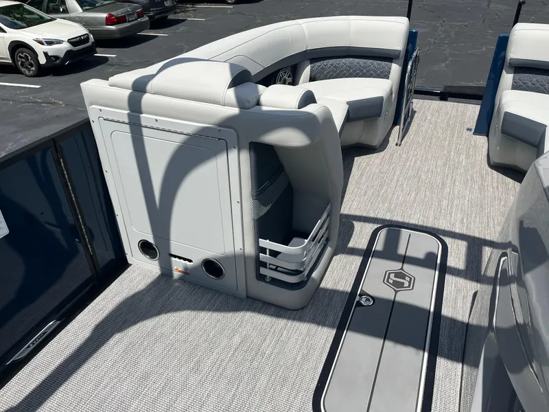 Slide: The Image of 2026 Harris Grand Mariner 230 interior with plush seating and modern design. - 17