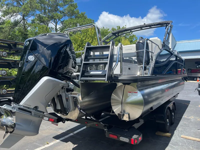 Slide: The Image of 2026 Harris Grand Mariner 230 pontoon boat with powerful outboard motor on trailer. - 3