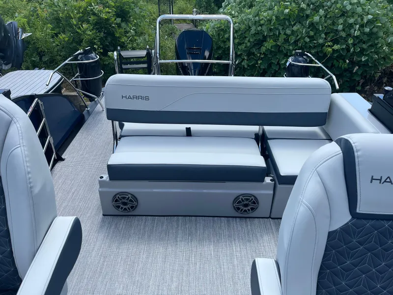 Slide: The Image of 2026 Harris Grand Mariner 230 boat interior with plush seating and modern design. - 7