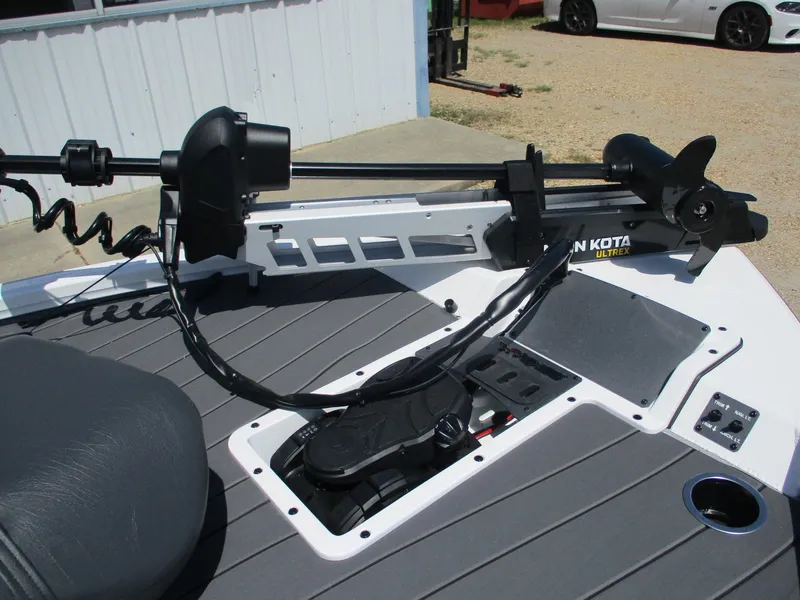 Slide: The Image of 2026 Vexus AVX1880 boat with Minn Kota Ultrex trolling motor on deck. - 9