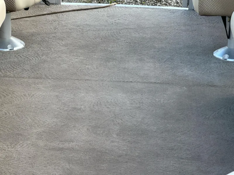 Slide: The Image of Carpeted floor of a 2009 Bennington 2577RFi boat interior. - 4