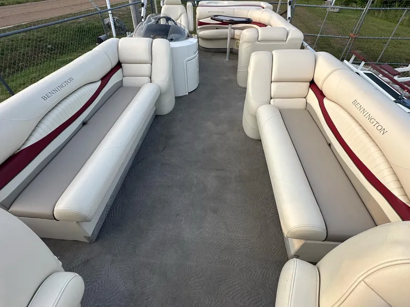 Slide: The Image of 2009 Bennington 2577RFi pontoon boat with spacious seating and elegant interior design. - 6