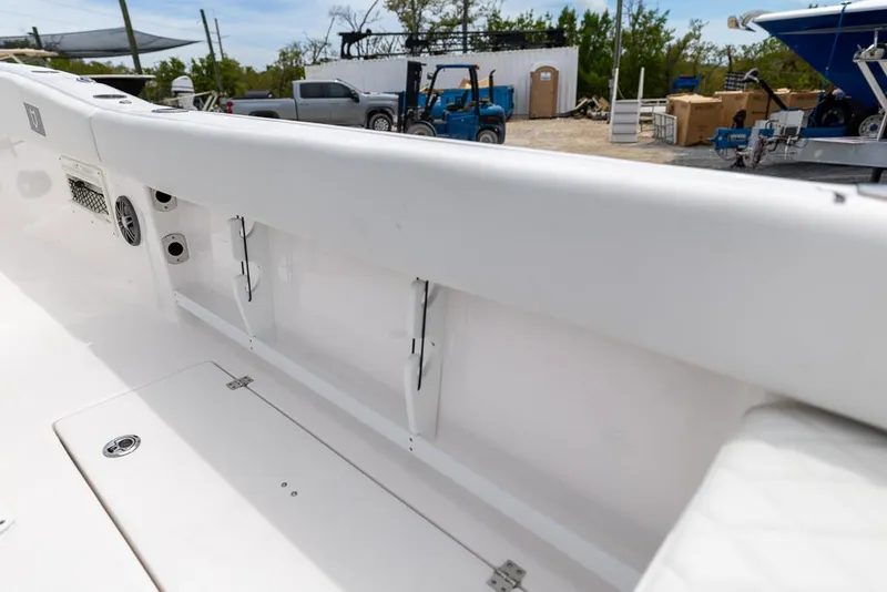 Slide: The Image of 2026 Sea Fox 268 Commander boat interior with storage compartments and speakers. - 20