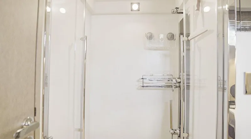 Slide: The Image of Luxurious bathroom interior of 2018 Prestige 500 Flybridge yacht, featuring modern shower design. - 24