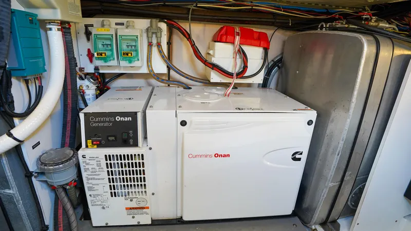 Slide: The Image of Cummins Onan generator in 2018 Prestige 500 Flybridge yacht engine room. - 41