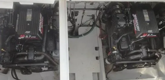 Slide: The Image of Twin Mercury engines in a 2001 Bayliner 3055 Ciera boat engine compartment. - 12
