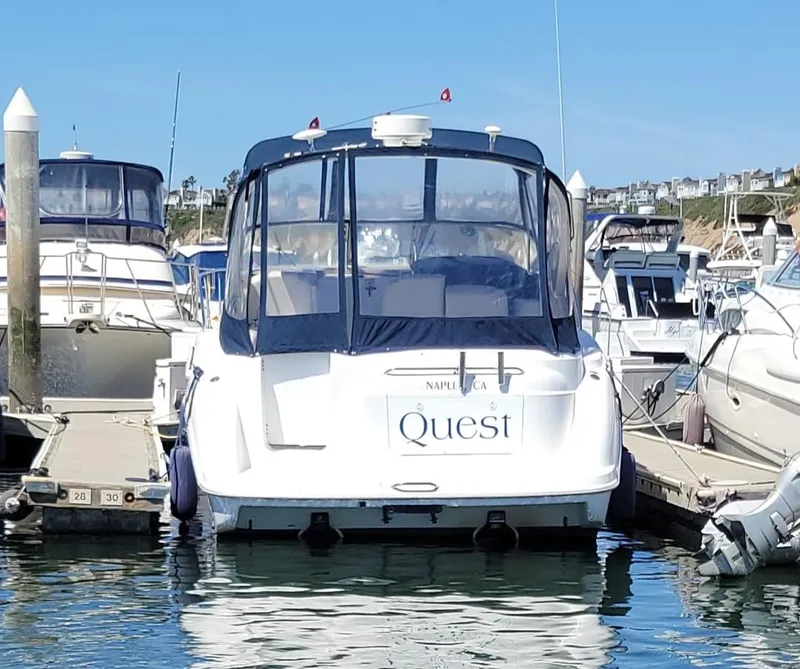 Slide: The Image of Bayliner 3055 Ciera 2001 boat docked in marina, rear view. - 22