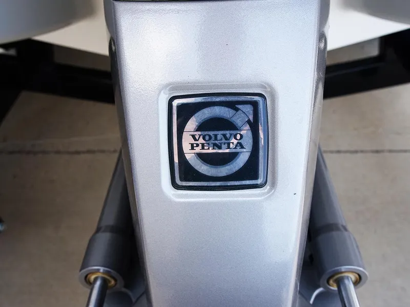 Slide: The Image of Close-up of Volvo Penta logo on 2022 Cobalt R6 Surf boat engine. - 20