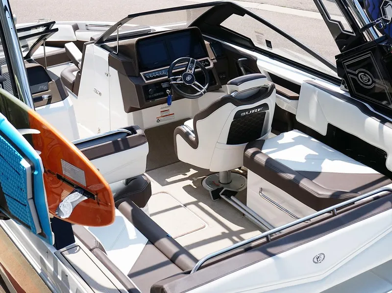 Slide: The Image of 2022 Cobalt R6 Surf boat interior with modern dashboard and seating. - 22