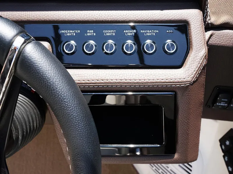 Slide: The Image of 2022 Cobalt R6 Surf dashboard with light controls and steering wheel detail. - 28