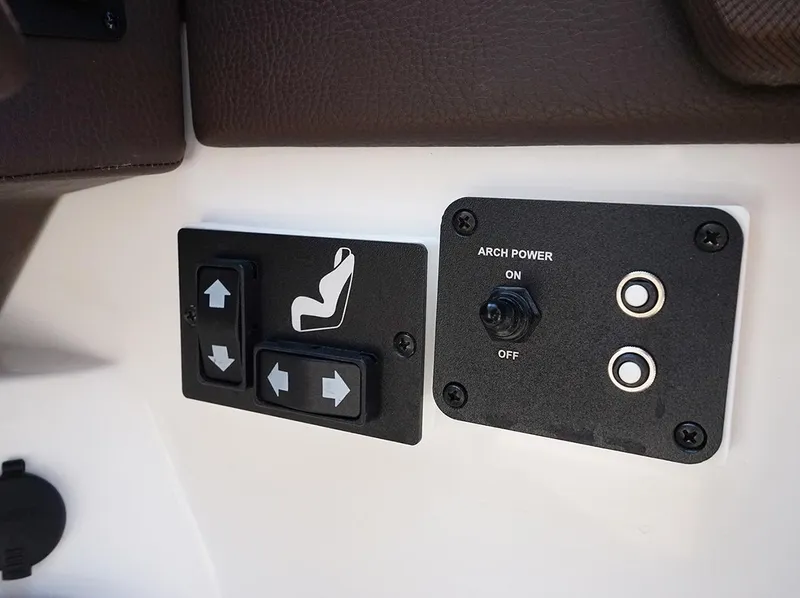 Slide: The Image of Control panel of 2022 Cobalt R6 Surf boat with seat and arch power switches. - 29