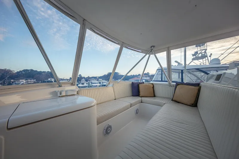 Slide: The Image of Luxurious interior of 2004 Ocean Yachts 57 Convertible with panoramic marina view. - 37