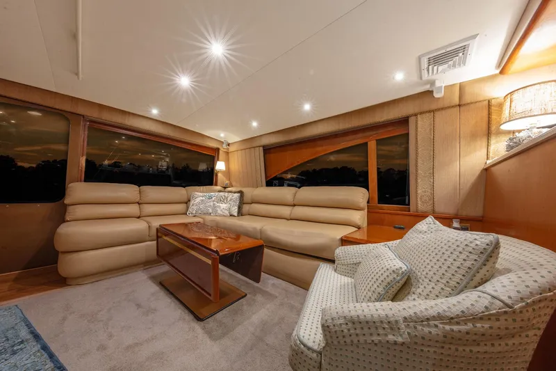 Slide: The Image of Luxurious interior of 2004 Ocean Yachts 57 Convertible with plush seating and elegant lighting. - 14