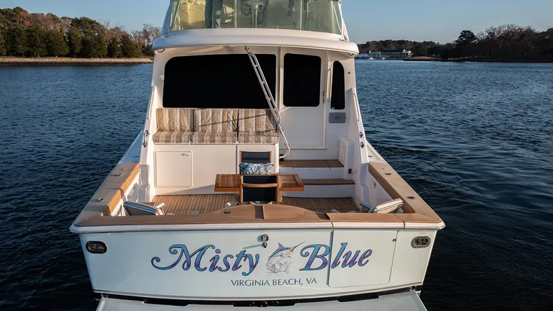 Slide: The Image of 2004 Ocean Yachts 57 Convertible boat named "Misty Blue" docked in Virginia Beach. - 6