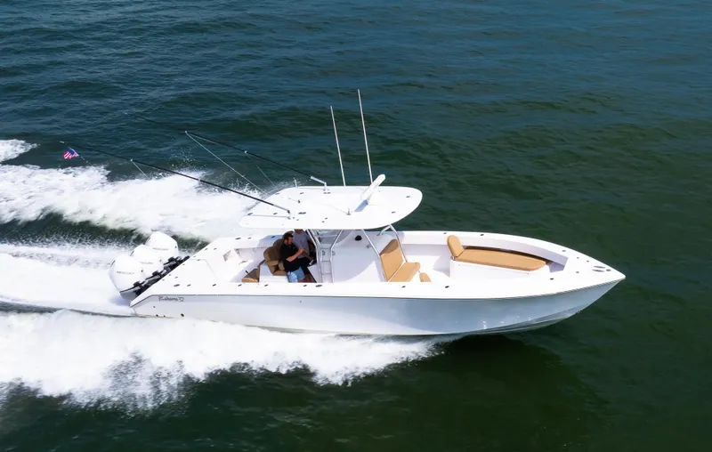 Slide: The Image of 2025 Bahama 37 Super Center Console cruising on open water. - 3