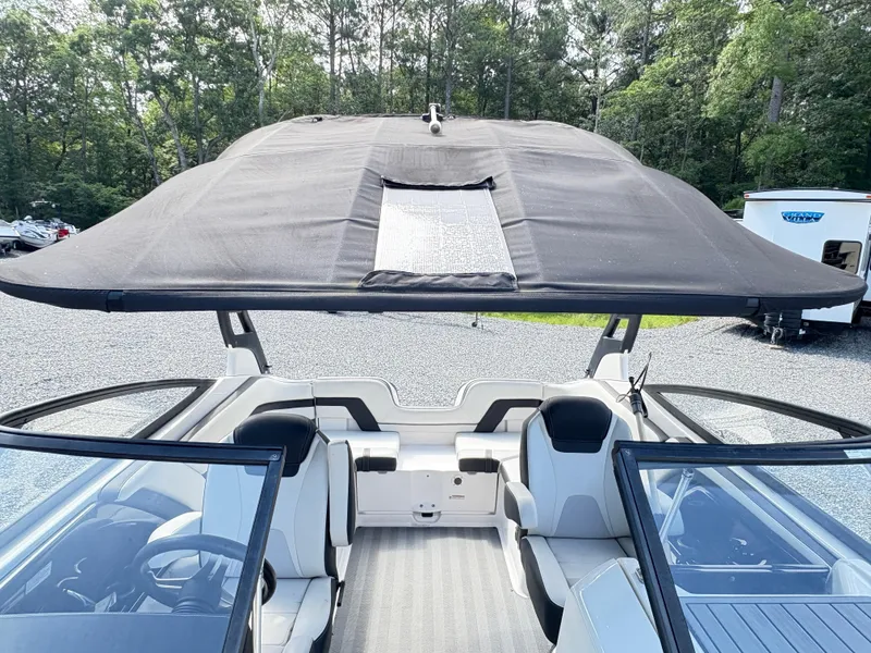 Slide: The Image of 2019 Yamaha Boats 242 Limited E-Series with canopy, interior view. - 11