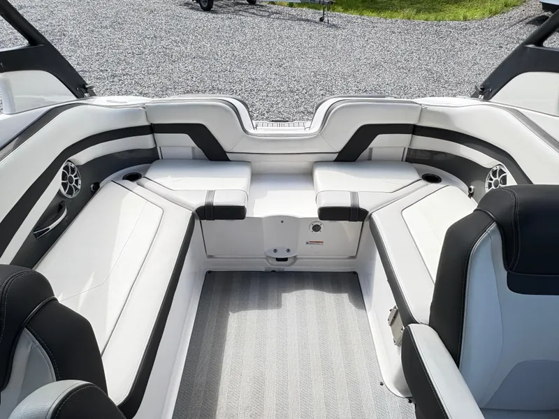 Slide: The Image of 2019 Yamaha Boats 242 Limited E-Series interior with sleek seating and modern design. - 9