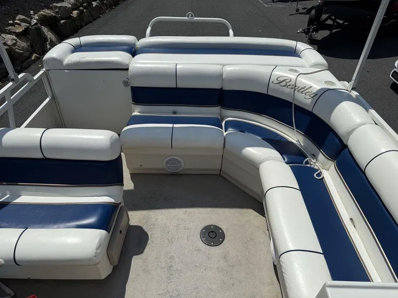 Slide: The Image of 2006 Bentley Pontoons 240 CRUISE interior with white and blue seating arrangement. - 15