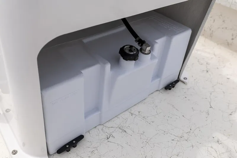 Slide: The Image of Fuel tank of 2026 Coastal Skiff 231 boat, showcasing storage and connection details. - 10
