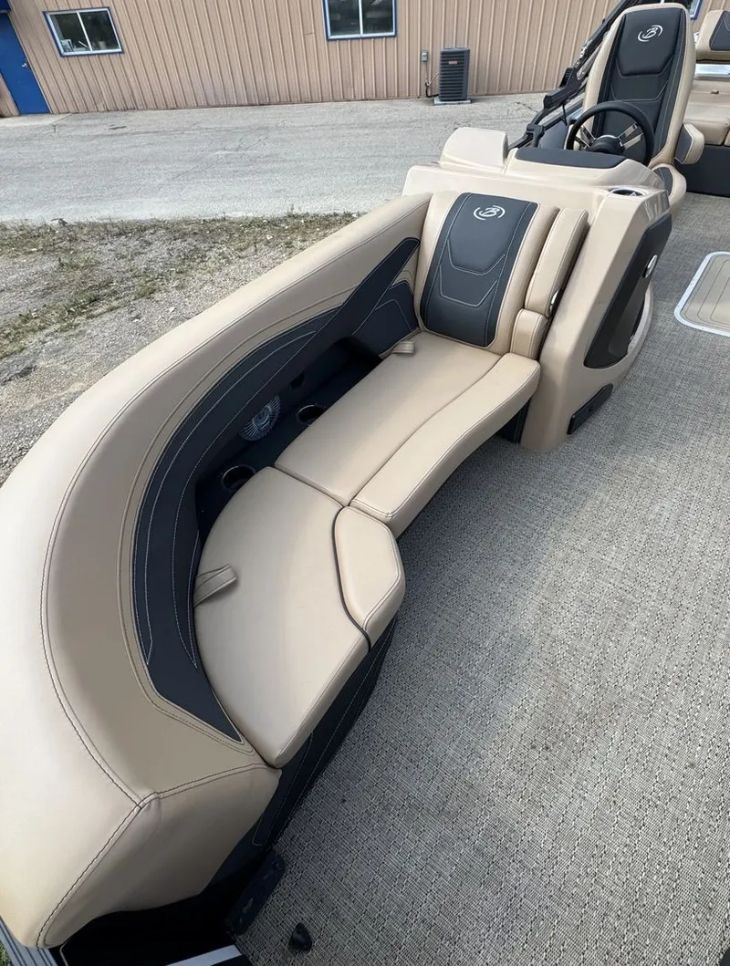 Slide: The Image of The image shows a beige seating area on a Barletta Cabrio 24 UE boat. - 22