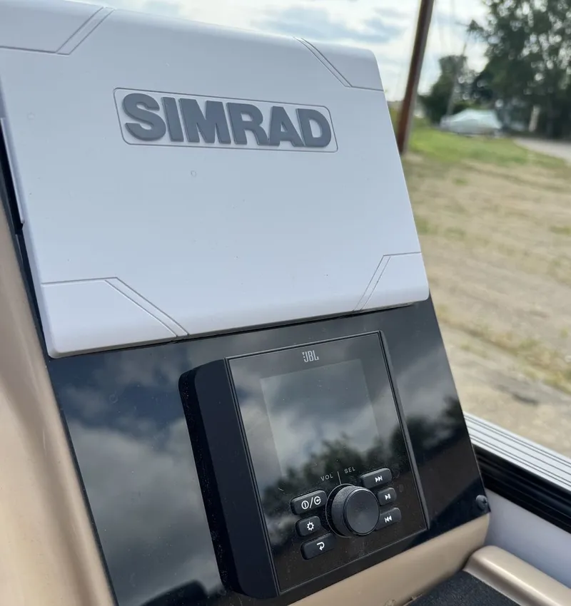 Slide: The Image of Close-up of a Simrad display on a Barletta Cabrio 24 UE boat. - 16