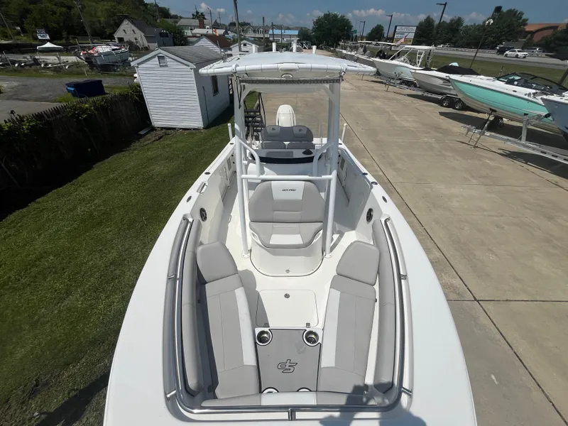 Slide: The Image of 2018 Sea Pro 219 Center Console boat with spacious seating and sleek design. - 9