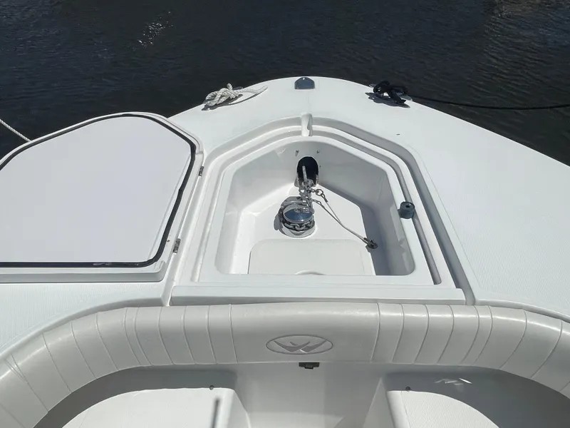 Slide: The Image of Bow view of 2006 Southport 26 Center Console boat with anchor compartment. - 4