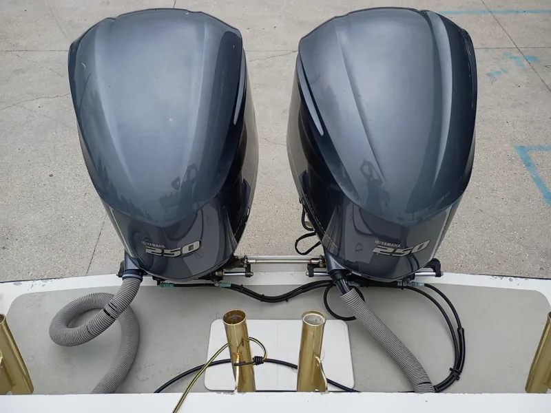 Slide: The Image of Twin Yamaha 250 outboard motors on a Custom 32CC boat, 2005 model. - 7