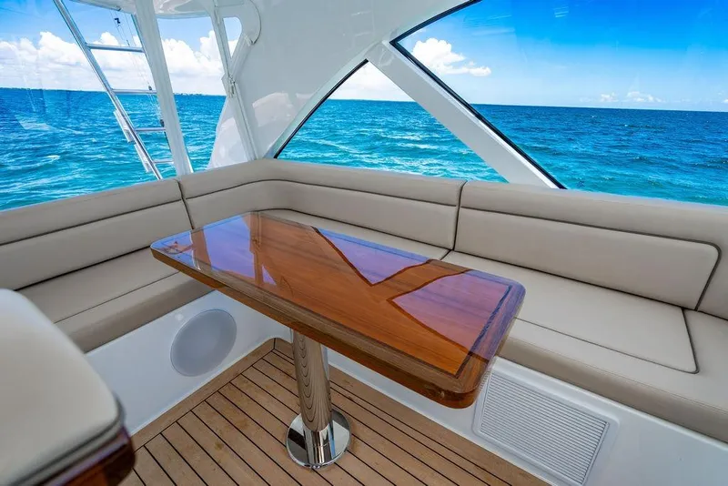 Slide: The Image of Luxurious interior of 2023 Hatteras GT45X yacht with ocean view. - 16