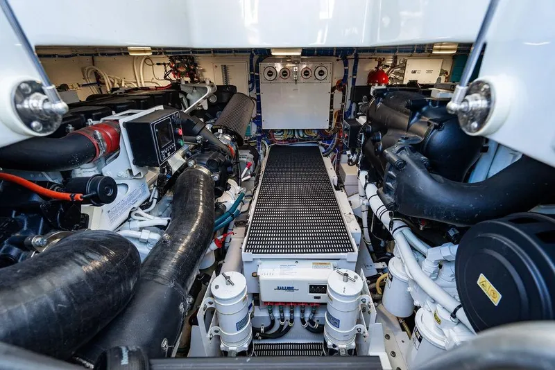Slide: The Image of Engine room of 2023 Hatteras GT45X yacht, showcasing advanced machinery and components. - 29