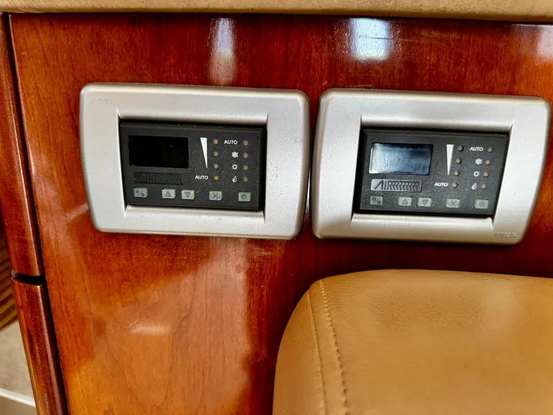 Slide: The Image of Control panels on a 2007 Meridian 411 Sedan yacht interior. - 18