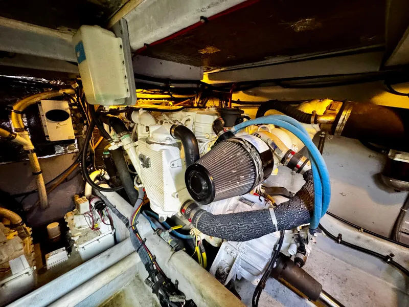 Slide: The Image of Engine room of a 2007 Meridian 411 Sedan, showcasing mechanical components and wiring. - 21