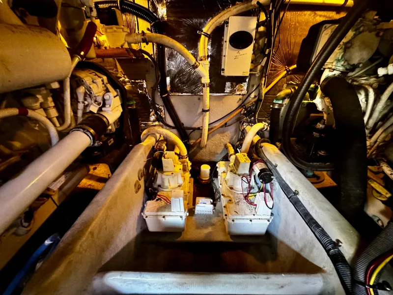 Slide: The Image of Engine room of a 2007 Meridian 411 Sedan with visible machinery and wiring. - 22