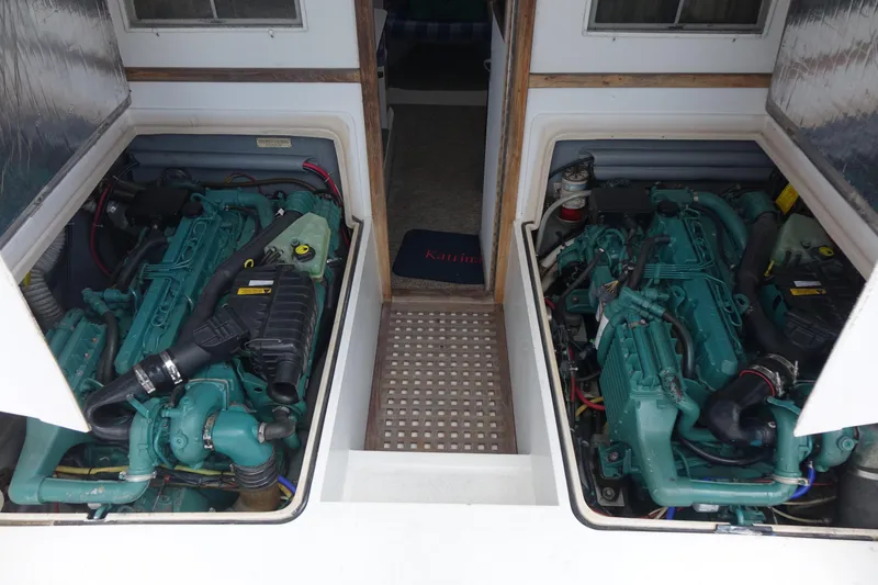 Slide: The Image of Twin engines in a 1988 Blackfin 29 Flybridge boat, showcasing engine compartment details. - 40